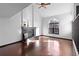 Living room with a fireplace, vaulted ceiling, and beautiful natural light at 96 S Lindsey St, Castle Rock, CO 80104