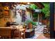 Stylish back patio featuring outdoor seating, a grill, and elegant landscaping for relaxation and entertainment at 1121 S Williams St, Denver, CO 80210