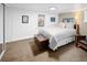 Bedroom with neutral decor, a comfortable bed, and closet at 1121 S Williams St, Denver, CO 80210