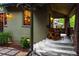 Cozy front porch featuring classic rocking chairs and a serene view of the neighborhood at 1121 S Williams St, Denver, CO 80210