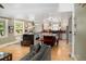 Bright, open kitchen featuring a center island with seating and modern appliances at 1121 S Williams St, Denver, CO 80210