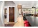 Open floor plan with hardwood floors leading from kitchen to living room at 1121 S Williams St, Denver, CO 80210