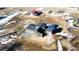 Aerial view of a home on a large lot with a barn at 4022 Arleigh Dr, Berthoud, CO 80513