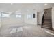 Finished basement with neutral carpeting and recessed lighting at 4022 Arleigh Dr, Berthoud, CO 80513