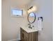 Modern bathroom with a floating vanity and updated fixtures at 4022 Arleigh Dr, Berthoud, CO 80513