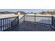 Deck overlooking snowy backyard and barn at 4022 Arleigh Dr, Berthoud, CO 80513