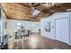 Open dining area with a wooden table and white chairs at 4022 Arleigh Dr, Berthoud, CO 80513