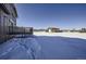 House exterior with deck and snowy yard at 4022 Arleigh Dr, Berthoud, CO 80513