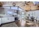 Modern kitchen with white cabinets and stainless steel appliances at 4022 Arleigh Dr, Berthoud, CO 80513