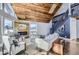 Open living room with a modern fireplace and high ceilings at 4022 Arleigh Dr, Berthoud, CO 80513