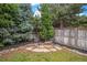 Secluded backyard featuring a cozy seating area and mature trees at 359 Wessex Cir, Highlands Ranch, CO 80126