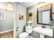 Powder room featuring pedestal sink, neutral walls and tiled floor at 359 Wessex Cir, Highlands Ranch, CO 80126