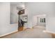 Spacious foyer with hardwood and carpet floors, view to living room, stairs, and dining room with modern lighting at 359 Wessex Cir, Highlands Ranch, CO 80126