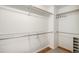 Walk-in closet featuring built-in shelving and ample storage space at 359 Wessex Cir, Highlands Ranch, CO 80126