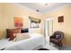 Bright bedroom with unique window treatment and relaxing natural light at 1602 Glen Bar Dr, Lakewood, CO 80215