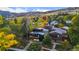 Scenic aerial view showcasing the property, its architectural details, and the vibrant surrounding foliage at 2725 6Th St, Boulder, CO 80304