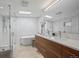 Modern bathroom featuring a walk-in shower, soaking tub, double vanity, and skylights at 2725 6Th St, Boulder, CO 80304