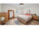 Cozy bedroom with light wood floors, natural wood furniture, and a serene atmosphere at 2725 6Th St, Boulder, CO 80304