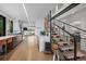 Modern kitchen with sleek cabinetry, stainless steel appliances, and a wood staircase at 2725 6Th St, Boulder, CO 80304