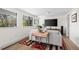 Well-lit living room with a comfortable couch and natural light streaming through the windows at 2725 6Th St, Boulder, CO 80304
