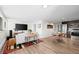 Open-concept living and dining area with stainless steel appliances and hardwood flooring at 2725 6Th St, Boulder, CO 80304