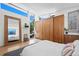 Bright main bedroom with large closets, hardwood floors, a large mirror, and neutral decor at 2725 6Th St, Boulder, CO 80304