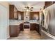 Modern kitchen features stainless steel appliances, granite countertops, and custom backsplash at 3659 W Union Ave, Denver, CO 80236