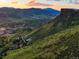 Breathtaking aerial view showcasing Golden, Colorado's natural beauty with its rolling hills and landscape at 409 Lookout View Dr, Golden, CO 80401