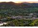 Scenic aerial view of Golden, Colorado nestled amongst foothills and mountains at 409 Lookout View Dr, Golden, CO 80401