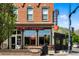 Charming brick commercial building with the Atomic Cowboy restaurant on the corner at 409 Lookout View Dr, Golden, CO 80401