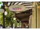 Charming storefront with overhead lighting and a sign for Goozell Gourmet Yogurt at 409 Lookout View Dr, Golden, CO 80401