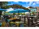 Inviting outdoor seating area with colorful tables and umbrellas, perfect for enjoying the Golden atmosphere at 409 Lookout View Dr, Golden, CO 80401