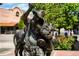 Detailed bronze statue in a downtown location, surrounded by greenery and charm at 409 Lookout View Dr, Golden, CO 80401