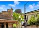 Scenic downtown streetscape with lush trees and a striking mountain backdrop at 409 Lookout View Dr, Golden, CO 80401
