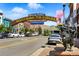 View of the Welcome to Golden sign with a statue of a bison and buildings on a sunny day at 409 Lookout View Dr, Golden, CO 80401
