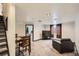Open basement area featuring carpeted floors, recessed lighting, a table, and a black couch at 12013 W 56Th Cir, Arvada, CO 80002
