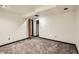 Finished bedroom with neutral walls, carpet, ceiling lights, and closet at 12013 W 56Th Cir, Arvada, CO 80002