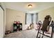 Bedroom with neutral walls, carpet, two windows, and light fixture at 12013 W 56Th Cir, Arvada, CO 80002