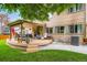 Wooden deck with outdoor seating and grill at 12013 W 56Th Cir, Arvada, CO 80002