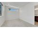 This bedroom is light and airy with plush carpeting at 1231 Newton St, Denver, CO 80204