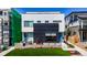 Modern two-story home featuring a landscaped yard, contemporary design, and stylish curb appeal at 1231 Newton St, Denver, CO 80204