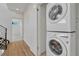 Convenient laundry area with stacked LG washer and dryer for efficient space-saving at 1231 Newton St, Denver, CO 80204