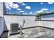 Rooftop patio with HVAC system perfect for relaxing and entertaining while providing comfort and functionality at 1231 Newton St, Denver, CO 80204