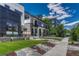 Charming homes nestled in a neighborhood, showcasing manicured lawns and tree-lined streets at 1231 Newton St, Denver, CO 80204