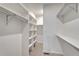 Spacious walk-in closet with ample shelving, modern design, and plenty of storage at 1231 Newton St, Denver, CO 80204