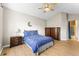 Bedroom with vaulted ceiling, ceiling fan, and ensuite access at 22263 E Euclid Dr, Aurora, CO 80016