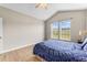 Bedroom with vaulted ceiling, window, and ceiling fan at 22263 E Euclid Dr, Aurora, CO 80016