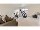 Cozy carpeted bonus room with gym equipment, perfect for a home fitness area at 4955 Trails Edge Ln, Castle Rock, CO 80104