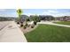 Walking path with views of playground, greenery and pedestrian crossing sign at 4955 Trails Edge Ln, Castle Rock, CO 80104