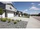 Street view featuring the home's exterior and landscaped front yard at 4955 Trails Edge Ln, Castle Rock, CO 80104